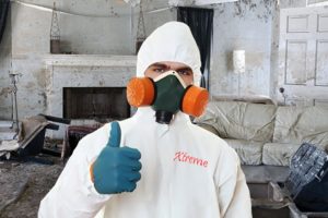An Xtreme Home Improvement technician in the process of mold remediation 